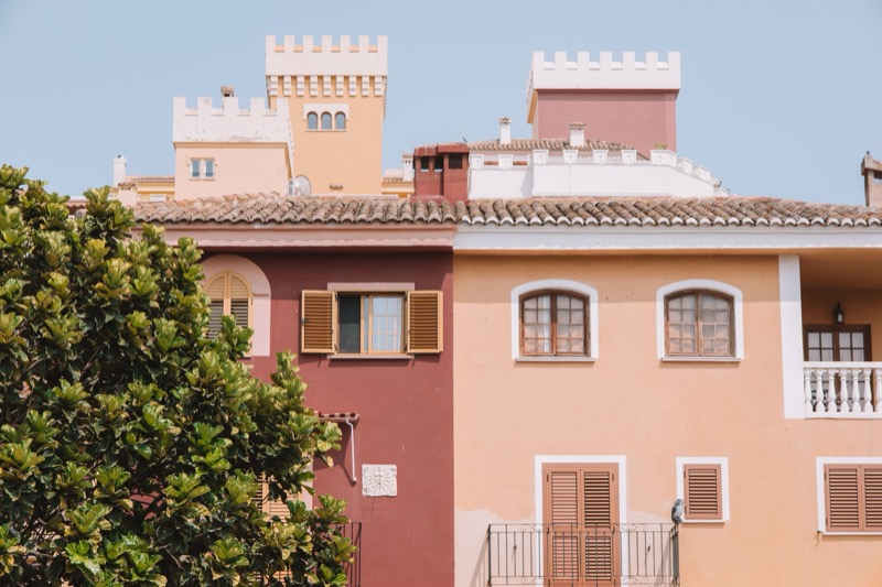 Charming Mediterranean-style buildings with shutters in Valencia, Spain.